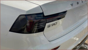 White Volvo S90 rear view